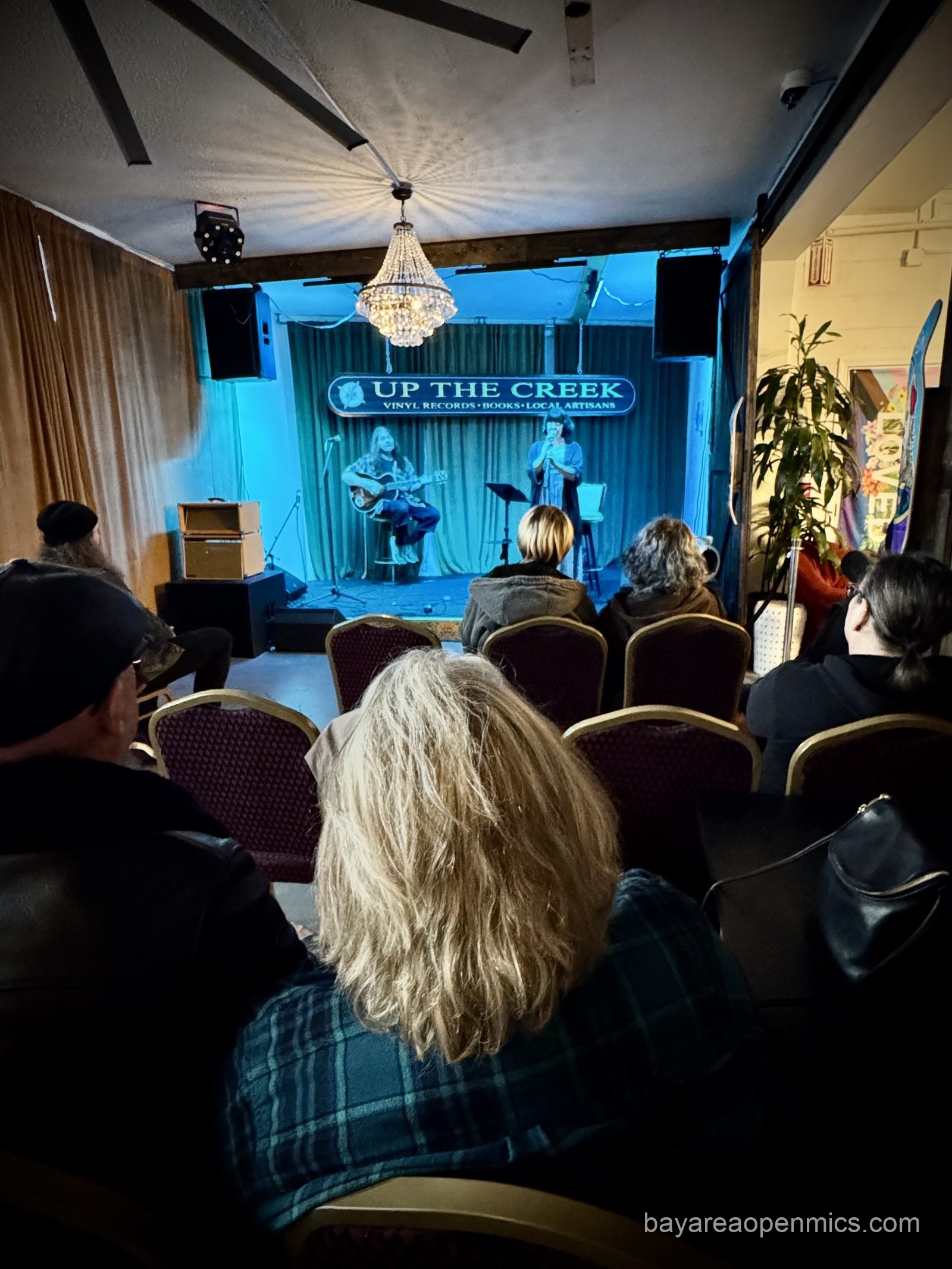 Up The Creek Records employee Lily sings Fade Into You by The Cowboy Junkies at their open mic