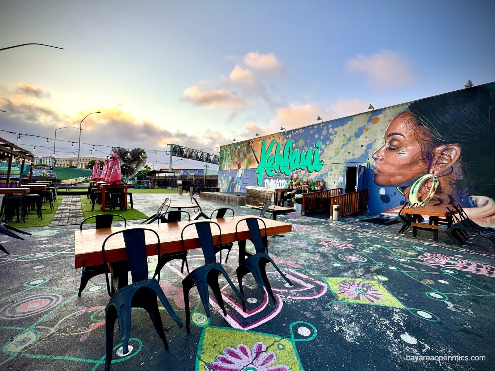 A colorful mural in the courtyard behind 7th West in West Oakland