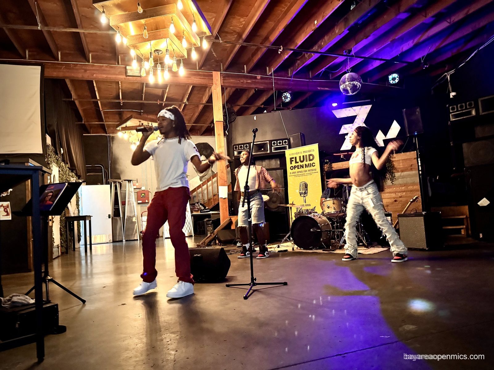 A third view of the PRNC dancers performing at the Fluid open mic