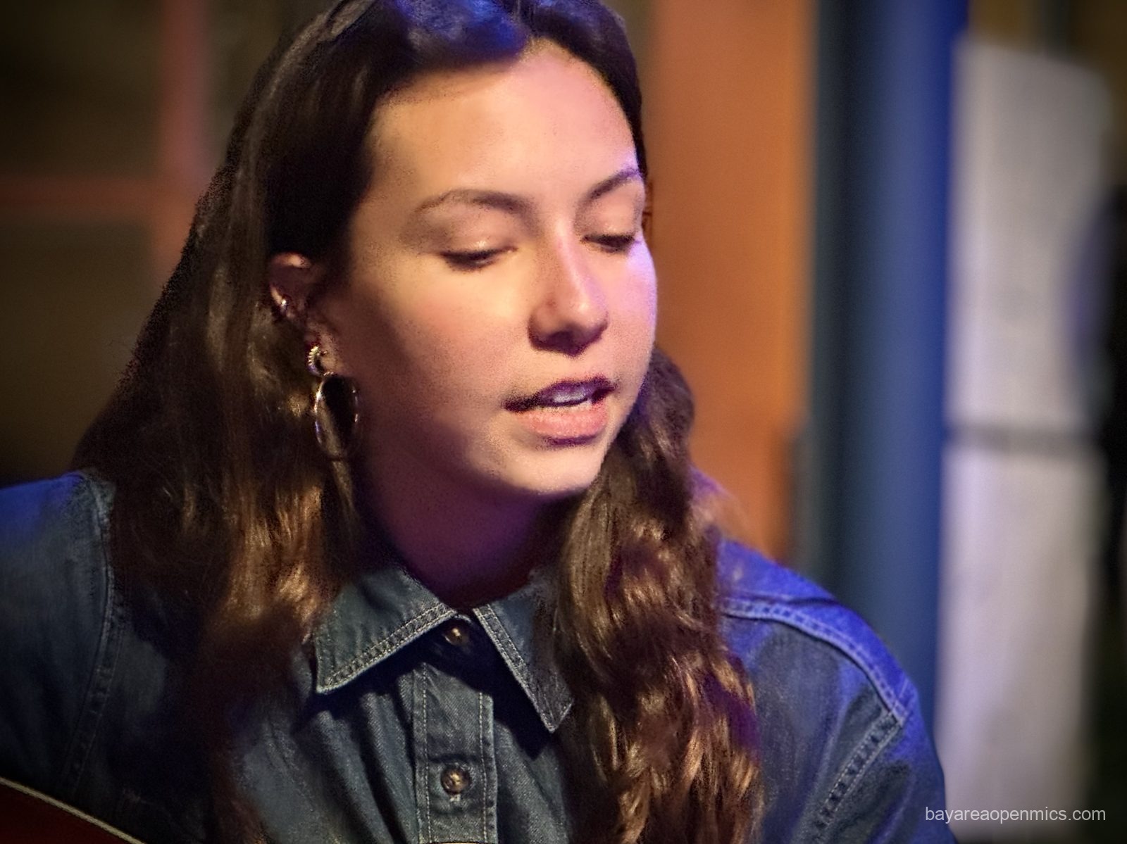 Saya performs at The Bazaar Cafe open mic in San Francisco