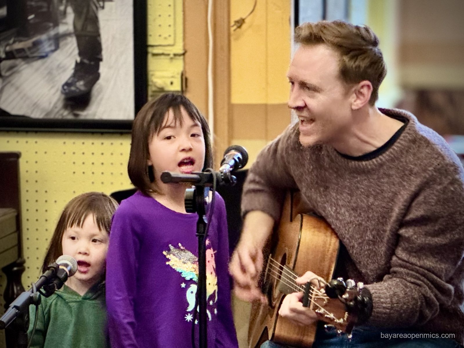 A family trio performs at Simple Pleasures Open Mic in San Francisco