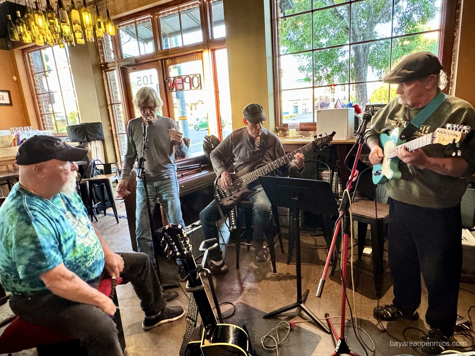 Dirty Dug plays harmonica at the Swirl on the Square acoustic open mic in Livermore