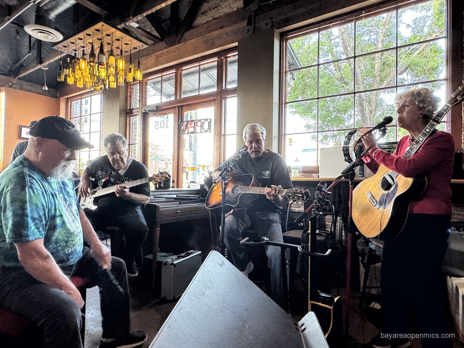 Steve Faria, Nadia, and band perform at the Swirl on the Square acoustic open mic in Livermore
