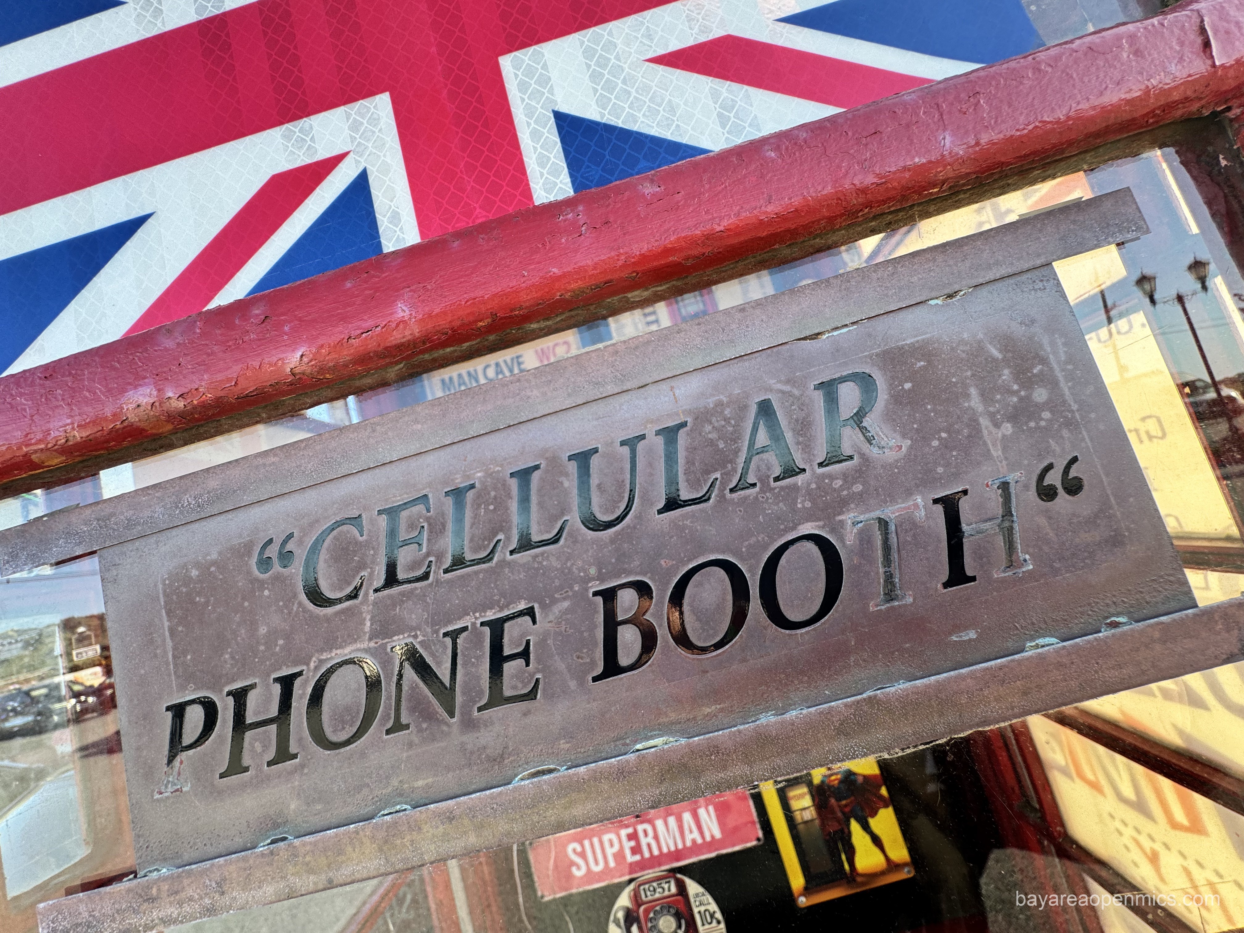 a sign declaring this is a cell phone booth