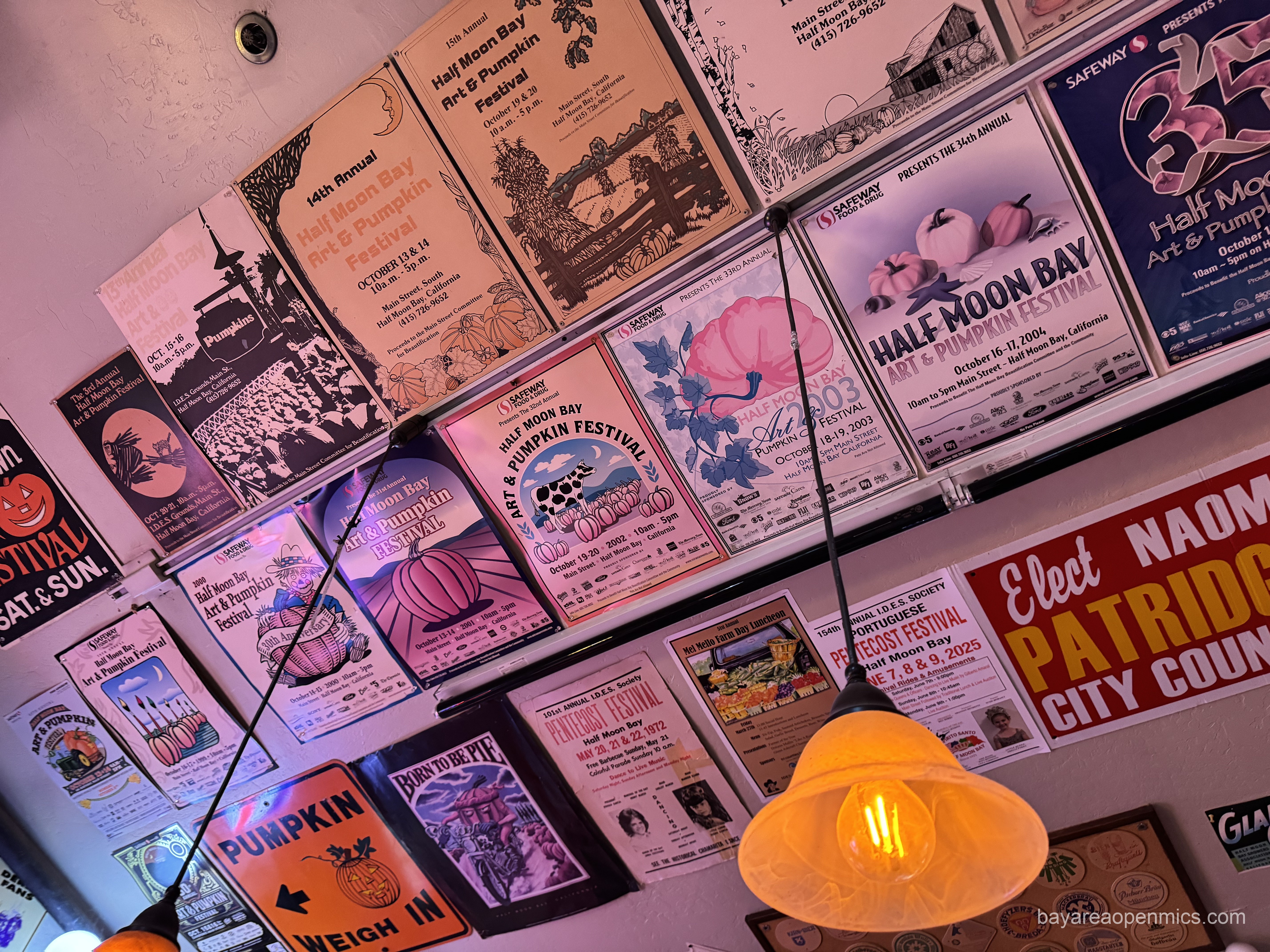 A ceiling full of Half Moon Bay pumpkin festival posters