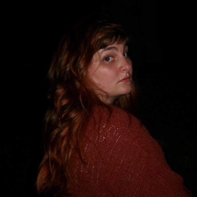 Caroline Milowicki, host at Bazaar Cafe Thursday Open Mic in Central Richmond, San Francisco, CA