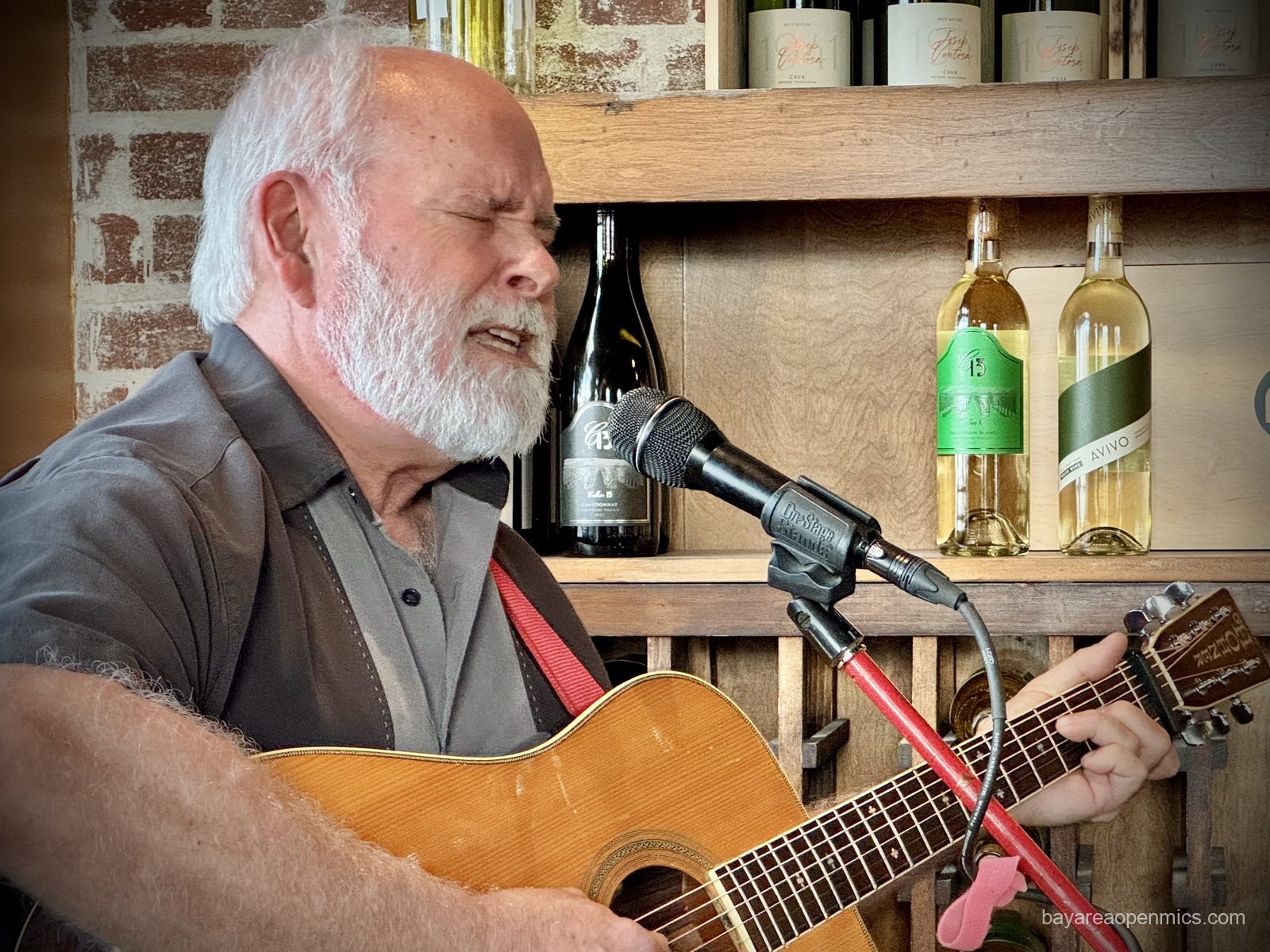 John Robertson performs at the Swirl on the Square acoustic open mic in Livermore